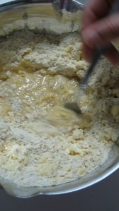 Using a fork bring together to wet ingredients with the dry ingredients. Add more buttermilk if it's too dry and add more flour if too wet. 