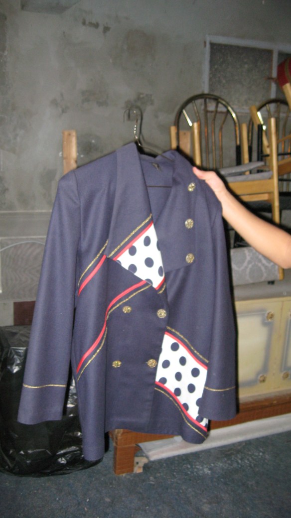 IMG_0691 don't know how they found this fabulous jacket. It used to be my grandmother's. My cousin of course snatched it!