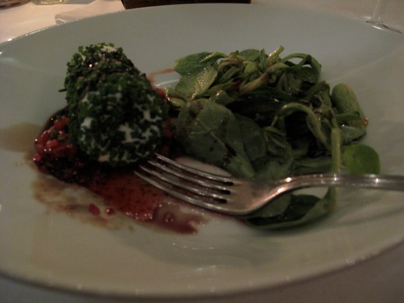 Goat cheese encrusted with chopped chives on top of sweet tomato relish and accompanished with lightly dressed lambs lettuce